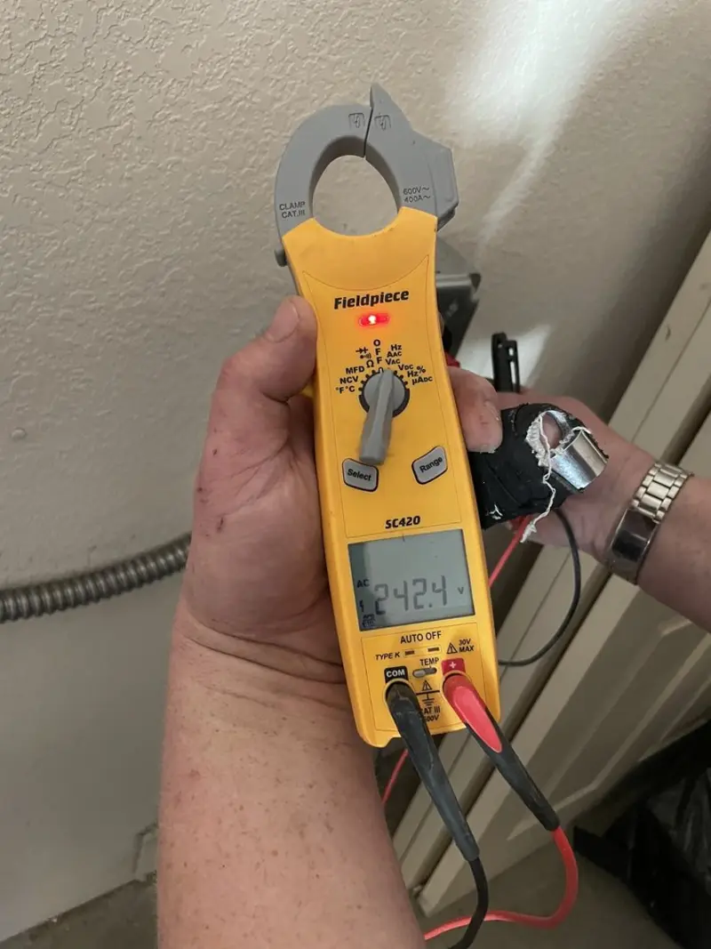 Voltage testing with clamp meter during Generator Installation in Swansea